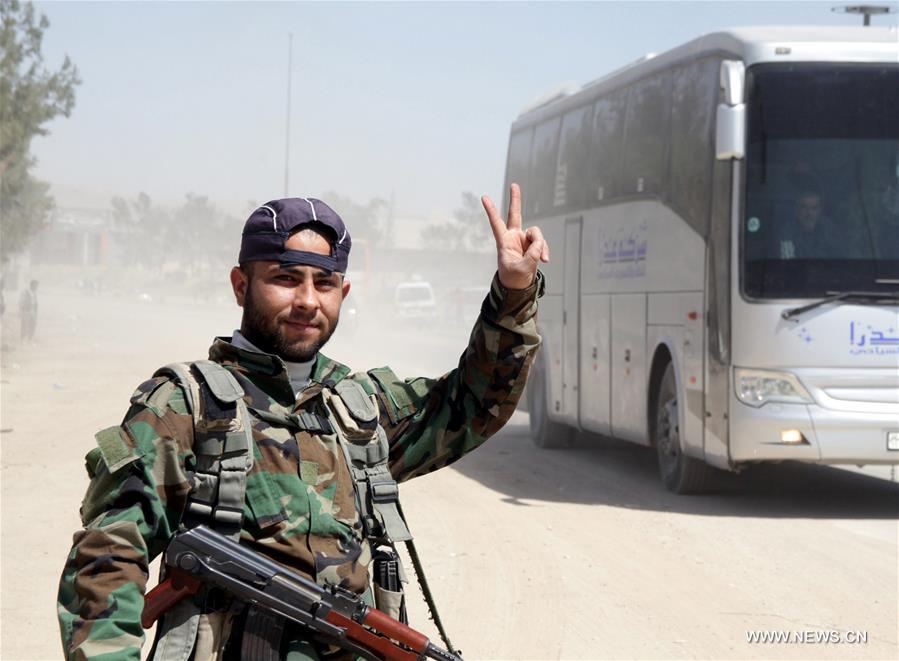 SYRIA-DAMASCUS-REBELS-EVACUATION