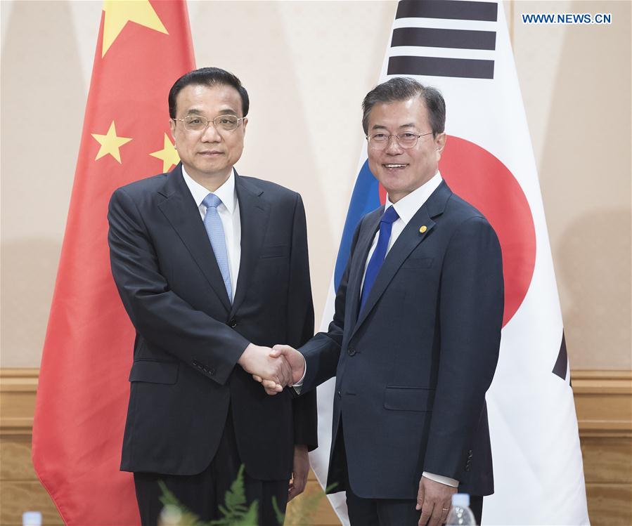 JAPAN-TOKYO-CHINA-LI KEQIANG-ROK-MOON JAE-IN-MEETING