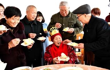 Centenarian celebrates her 105th birthday with family on 1st day of Chinese Lunar New Year