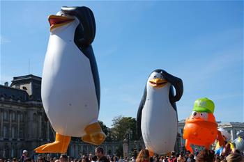 People attend Balloon's Day Parade of 2019 Brussels Comic Strip Festival